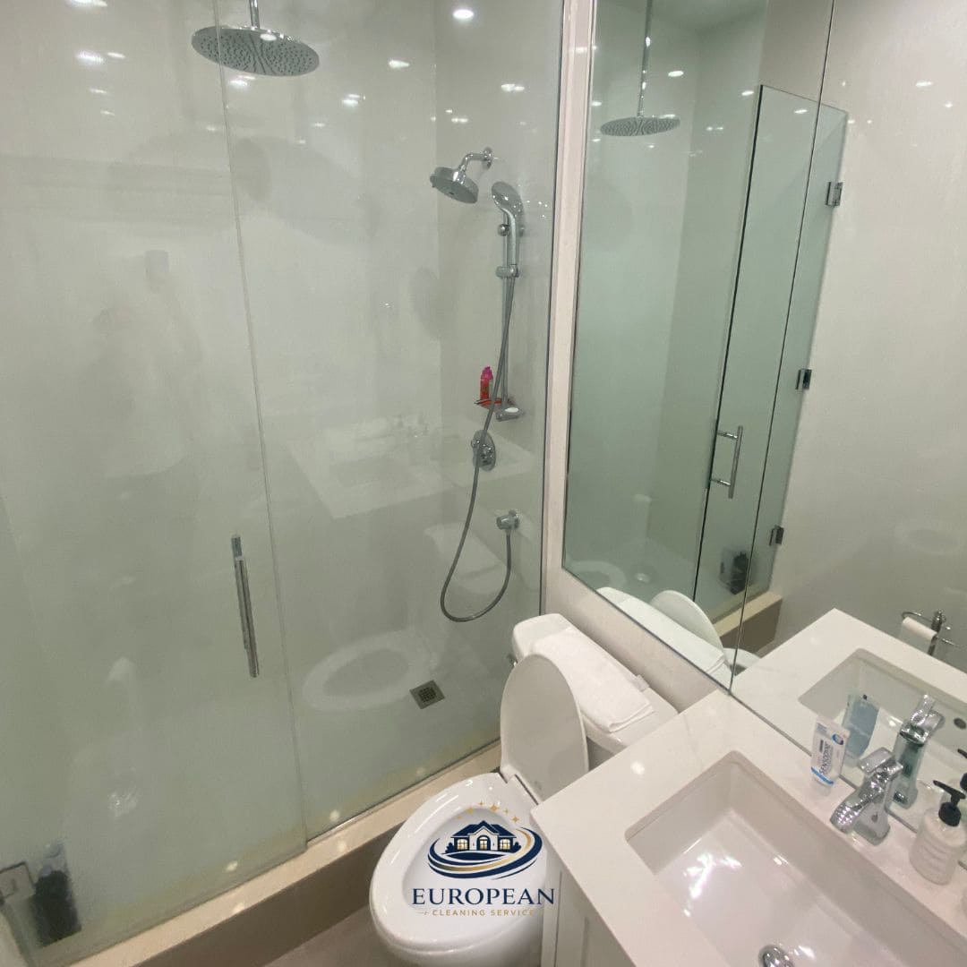 Spotless bathroom with rainfall shower